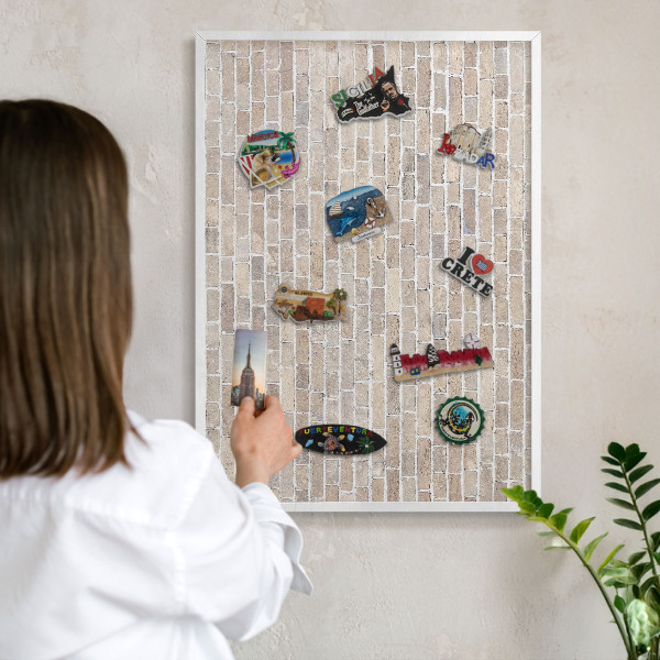 Magnetic board for travel magnets in a white frame Brick pattern