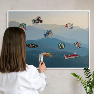 Magnetic board for travel magnets in a white frame Mountain views