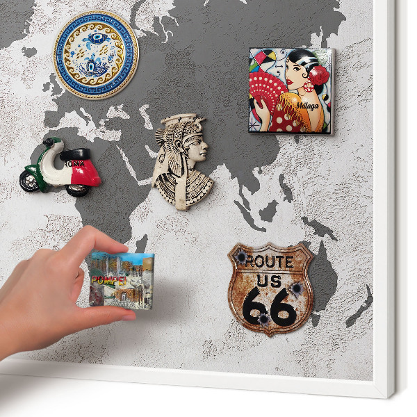 Magnetic board for travel magnets in a white frame World map