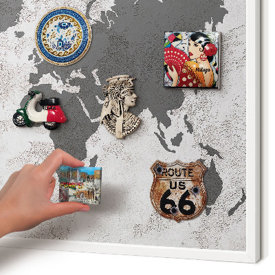 Magnetic board for travel magnets in a white frame World map
