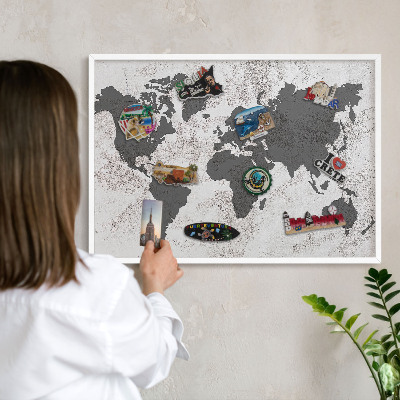Magnetic board for travel magnets in a white frame World map