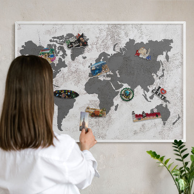 Magnetic board for travel magnets in a white frame World map