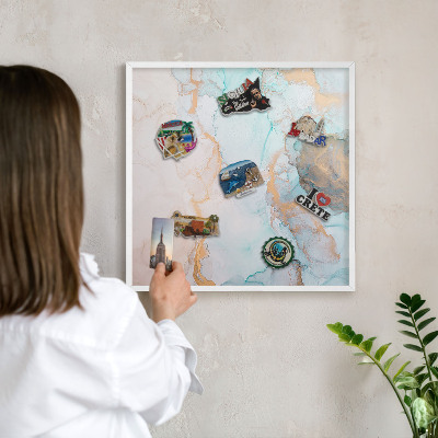 Magnetic board for travel magnets in a white frame Pastel forms