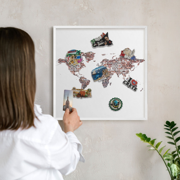 Magnetic board for travel magnets in a white frame Brick world
