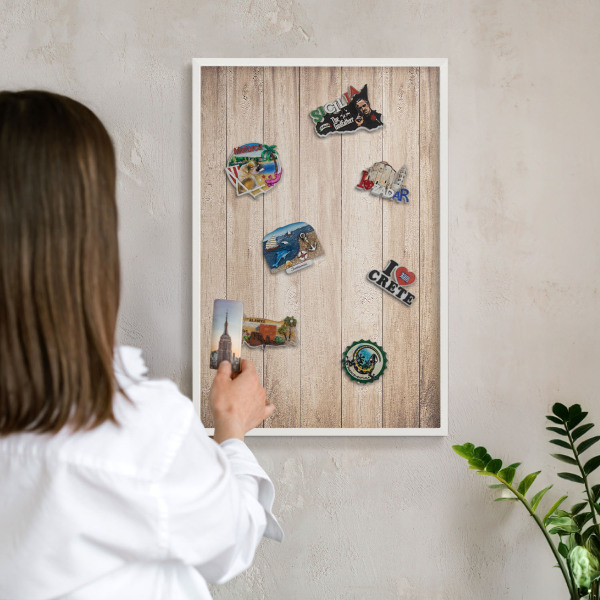 Decorative magnet board with a white frame Wooden boards