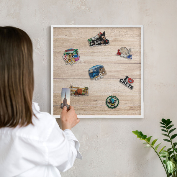Decorative magnet board with a white frame Wooden boards