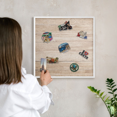 Decorative magnet board with a white frame Wooden boards