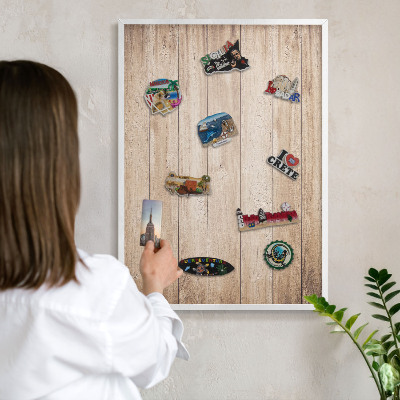 Decorative magnet board with a white frame Wooden boards