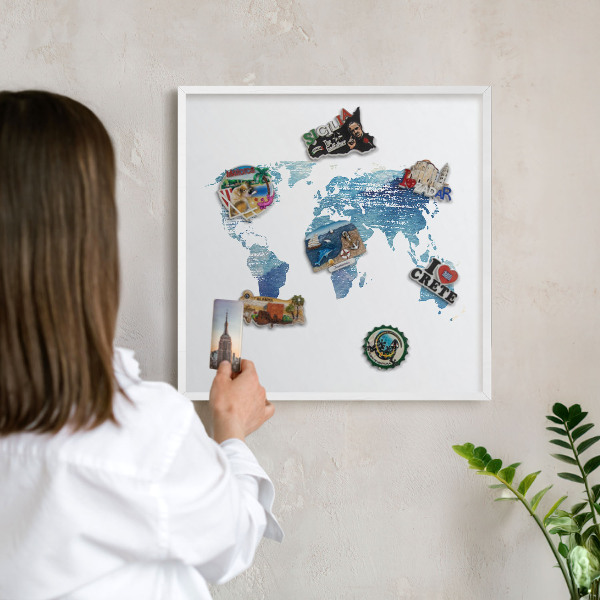 Magnetic board for travel magnets in a white frame Watercolor map