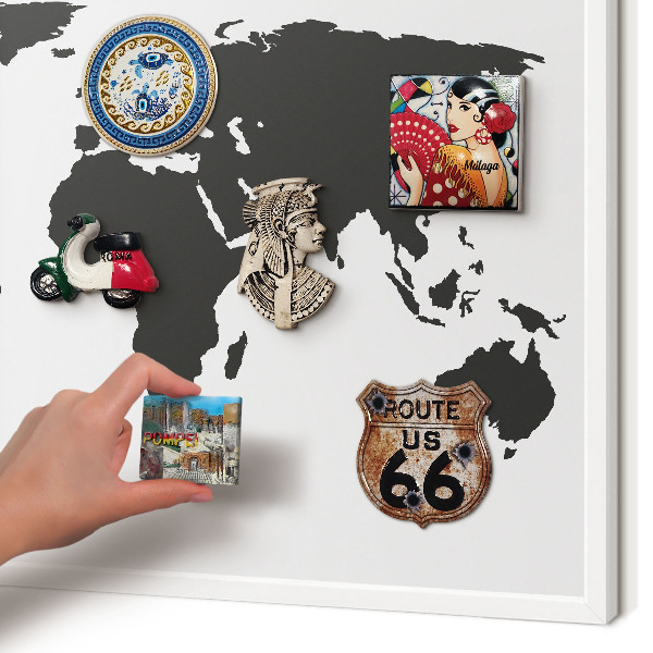 Magnetic board for travel magnets in a white frame World map