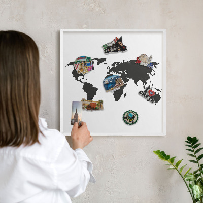 Magnetic board for travel magnets in a white frame World map