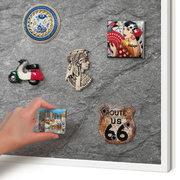 Magnetic board for travel magnets in a white frame Gray stone