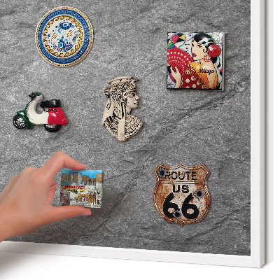 Magnetic board for travel magnets in a white frame Gray stone