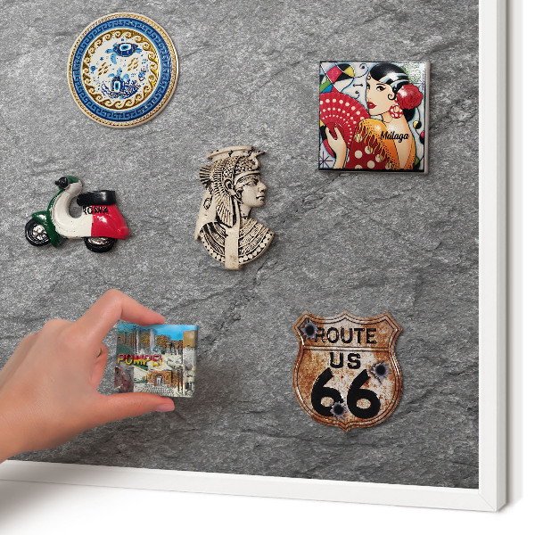 Magnetic board for travel magnets in a white frame Gray stone