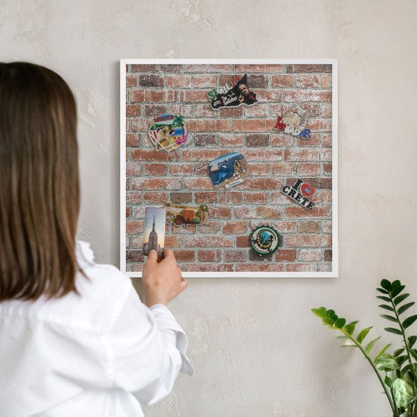 Decorative magnet board with a white frame Brick wall