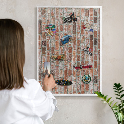 Decorative magnet board with a white frame Brick wall