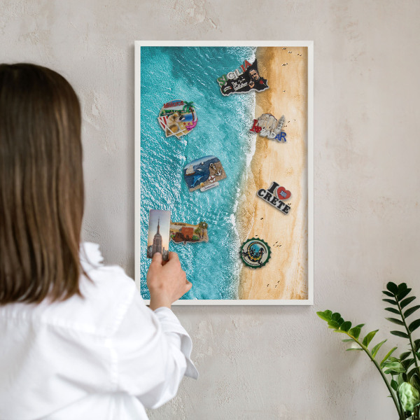 Magnetic board for travel magnets in a white frame Sea and beach