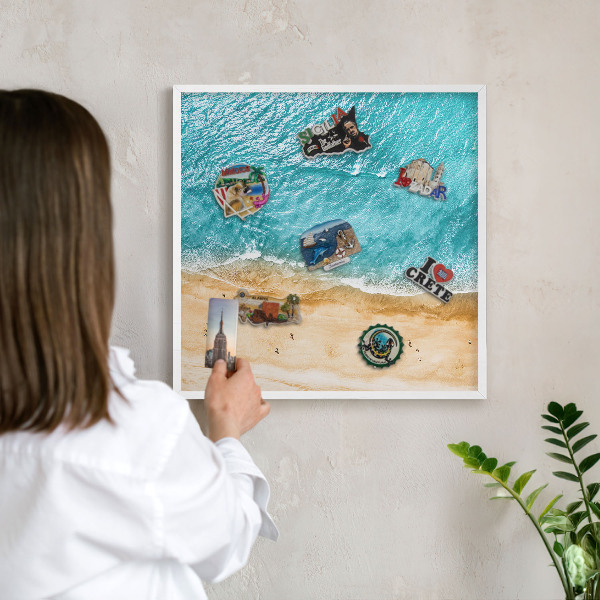 Magnetic board for travel magnets in a white frame Sea and beach