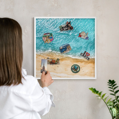 Magnetic board for travel magnets in a white frame Sea and beach
