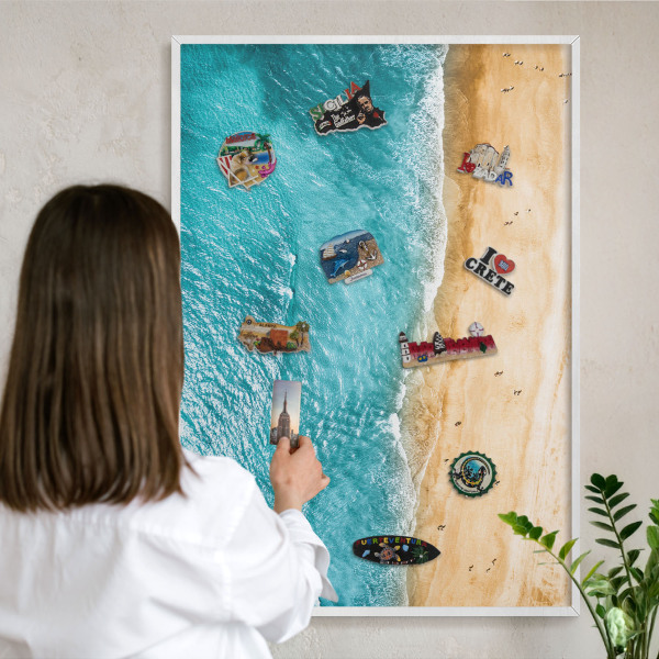 Magnetic board for travel magnets in a white frame Sea and beach