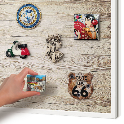 Magnetic board for travel magnets in a white frame Wooden texture