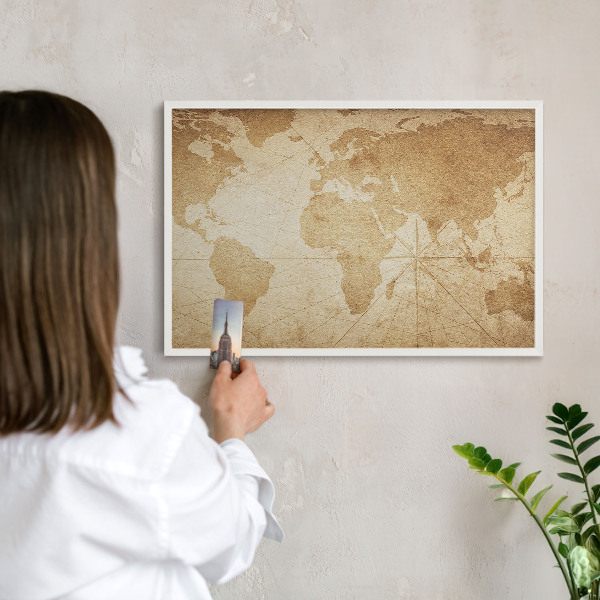 Magnetic board for travel magnets in a white frame Old map