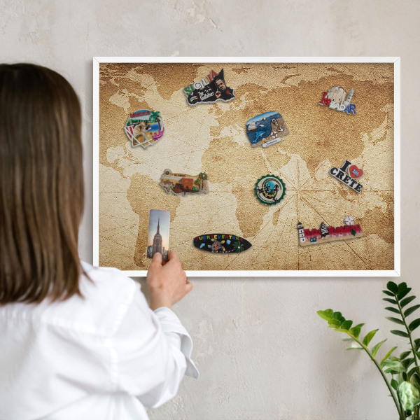 Magnetic board for travel magnets in a white frame Old map