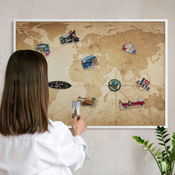 Magnetic board for travel magnets in a white frame Old map