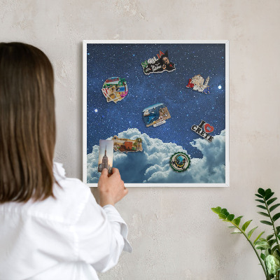 Magnetic board for travel magnets in a white frame Cosmic night