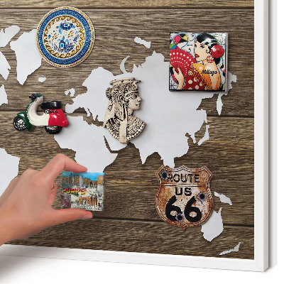 Magnetic board for travel magnets in a white frame Wooden map