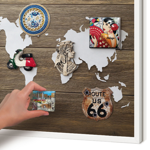 Magnetic board for travel magnets in a white frame Wooden map