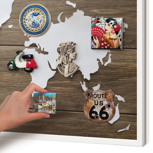 Magnetic board for travel magnets in a white frame Wooden map