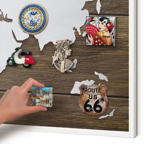 Magnetic board for travel magnets in a white frame Wooden map