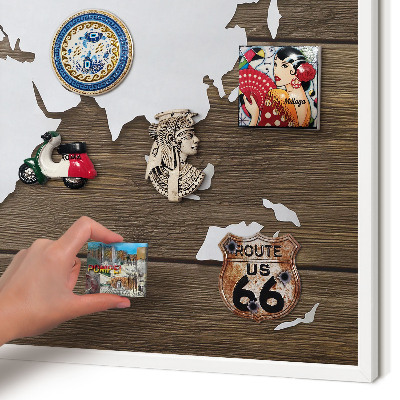 Magnetic board for travel magnets in a white frame Wooden map