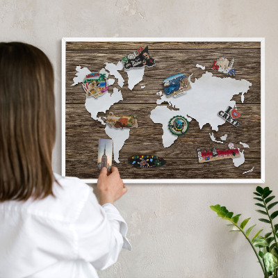 Magnetic board for travel magnets in a white frame Wooden map