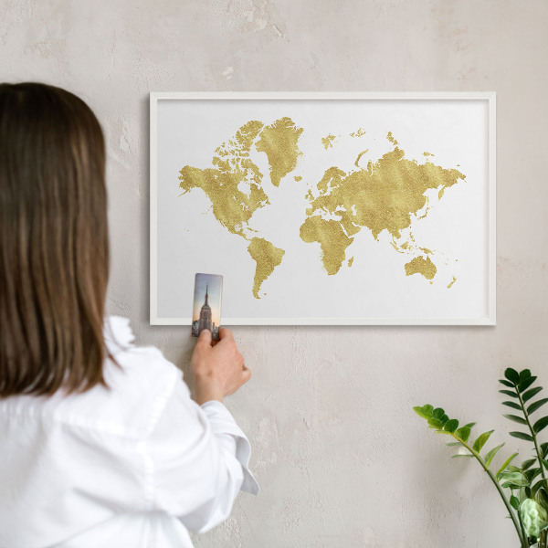 Decorative magnet board with a white frame World map