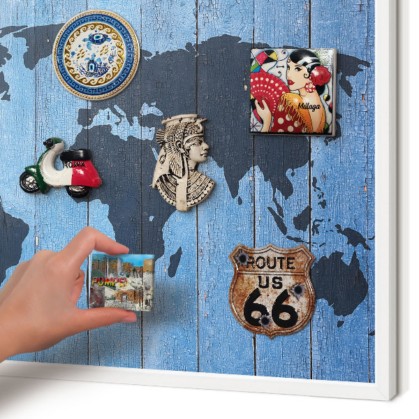 Magnetic board for travel magnets in a white frame World map