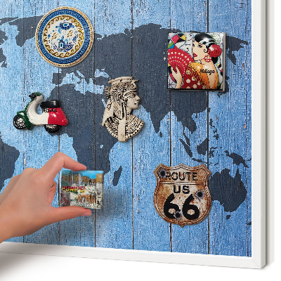 Magnetic board for travel magnets in a white frame World map