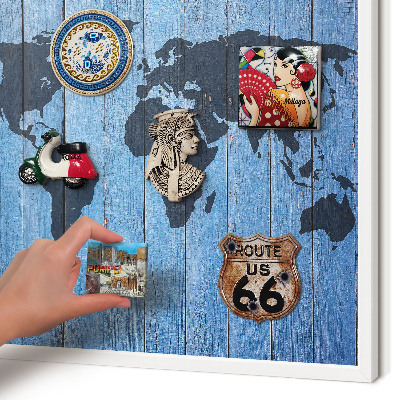 Magnetic board for travel magnets in a white frame World map