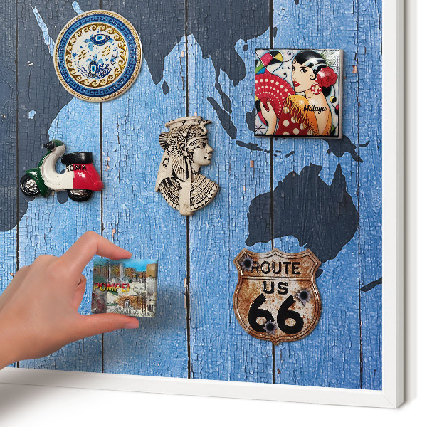 Magnetic board for travel magnets in a white frame World map