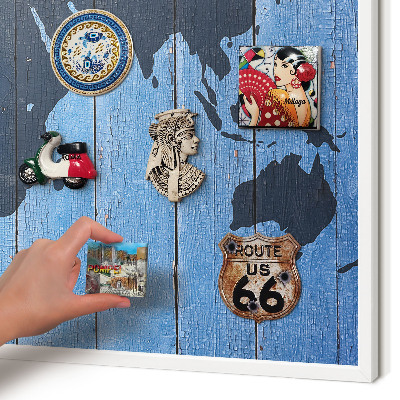 Magnetic board for travel magnets in a white frame World map