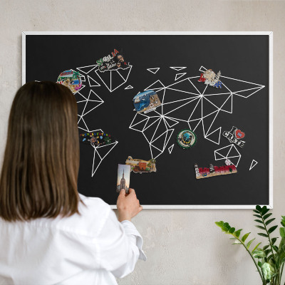 Magnetic board for travel magnets in a white frame World map