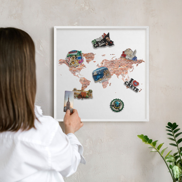 Decorative magnet board with a white frame Brick map
