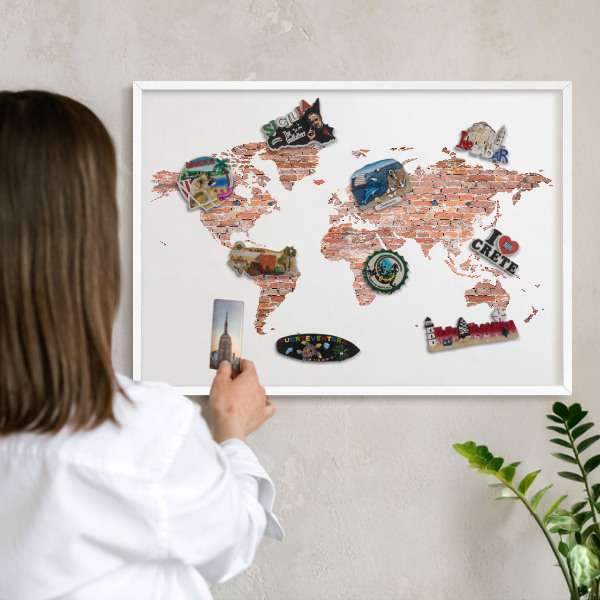 Decorative magnet board with a white frame Brick map