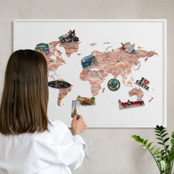 Decorative magnet board with a white frame Brick map
