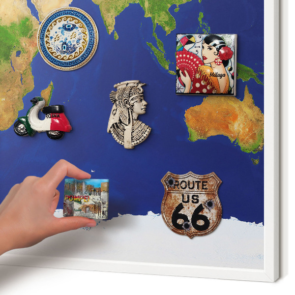 Decorative magnet board with a white frame Mapping the globe