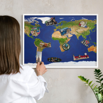 Decorative magnet board with a white frame Mapping the globe