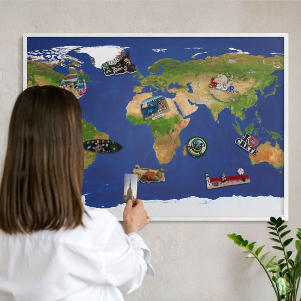 Decorative magnet board with a white frame Mapping the globe