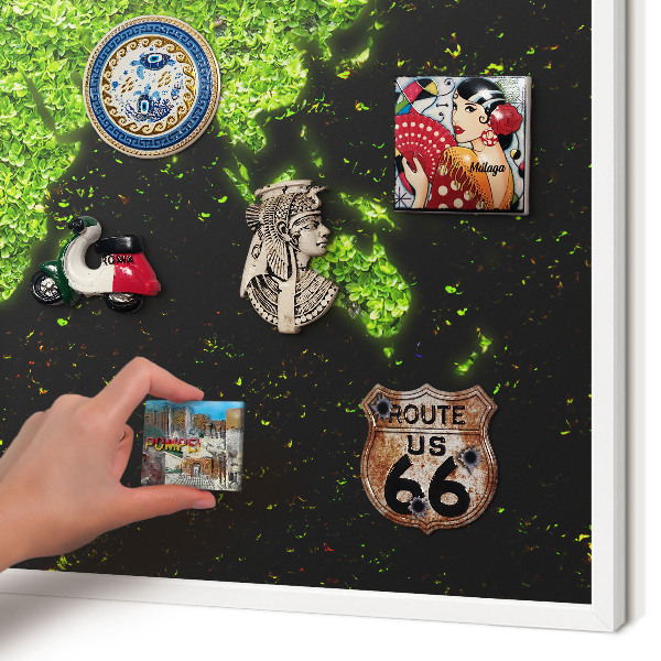 Magnetic board for travel magnets in a white frame Green map