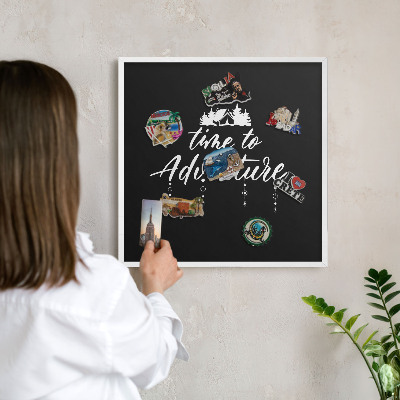 Decorative magnet board with a white frame Adventure awaits